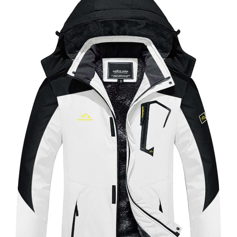 0-3b5a76.jpeg Parka ski femme coupe vent et imperméable, de couleur blanche et noire. Sur un fond blanc.
